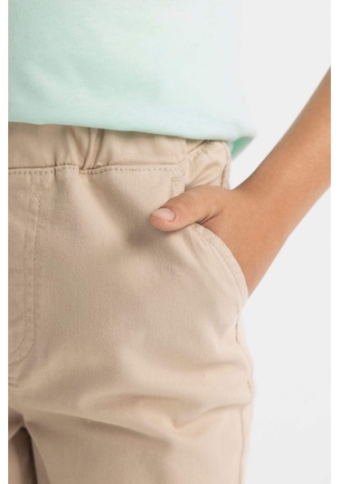 DeFacto Erkek Çocuk Düz Paça Beli Lastikli Cepli Bej Basic Düz Gabardin Okul Pantolonu T8850A624AUBG732