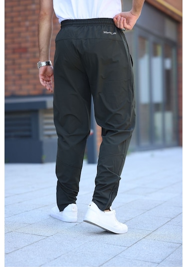 Erkek Haki Baggy Eşofman Altı Fermuarlı Paça Kaliteli Paraşüt Kumaş Haki Erkek Haki Baggy Eşofman Altı Fermuarlı Paça Kaliteli Paraşüt Kumaş Haki