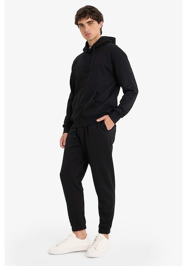 Defacto - Regular Fit Beli Bağcıklı Cepli Paçası Lastikli Şardonlu Basic Düz Jogger Eşofman Altı E6326AX25AU Siyah Defacto - Regular Fit Beli Bağcıklı Cepli Paçası Lastikli Şardonlu Basic Düz Jogger Eşofman Altı E6326AX25AU Siyah