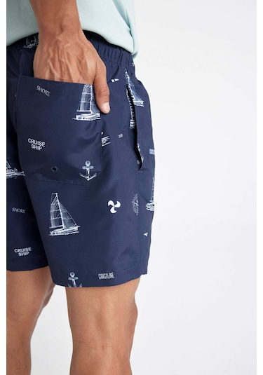 DeFacto Regular Fit Desenli File Astarlı Kısa Boy Deniz Şortu M8344AZ24HSNV256 DeFacto Regular Fit Desenli File Astarlı Kısa Boy Deniz Şortu M8344AZ24HSNV256