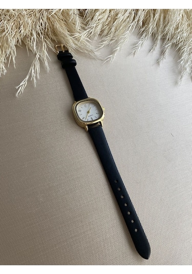 Retro Minimal Vintage Deri Kordon Kadın Kol Saati Kelebek Model Gümüş