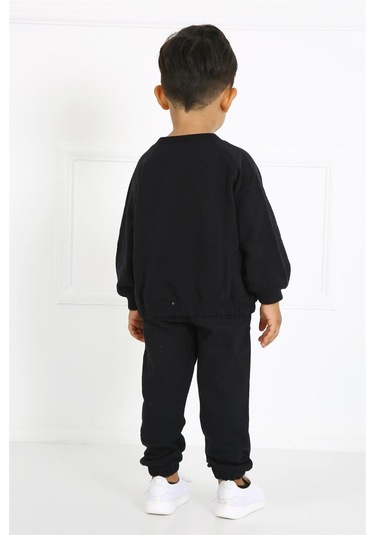 Luess Cep Detaylı Organik Pamuk Oversize Kesim Çocuk Alt Üst Takım - Siyah Luess Cep Detaylı Organik Pamuk Oversize Kesim Çocuk Alt Üst Takım - Siyah