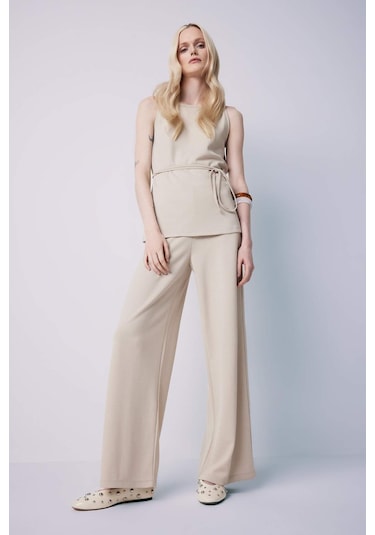 DeFacto Regular Fit Kayık Yaka Bağcıklı Pike Kolsuz Bluz	 E5778AX25SPBG187