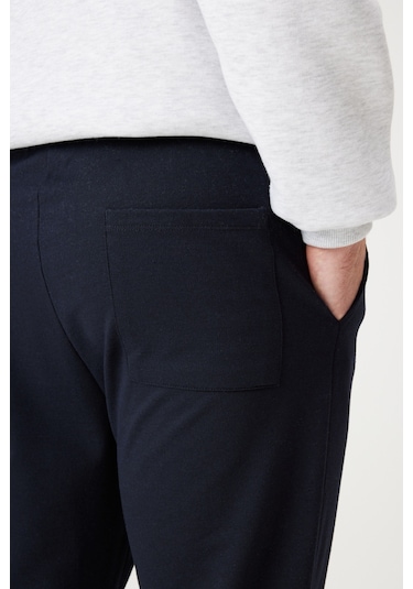 AC&Co / Altınyıldız Classics Standart Fit Normal Kesim Pamuklu Baskılı Cepli Erkek Eşofman Altı Lacivert