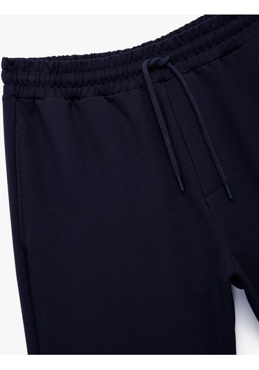 Koton Pamuklu Rahat Kalıp Cep Detaylı Beli Bağcıklı Spor Şort Lacivert 6wam40083nk Lacivert Koton Pamuklu Rahat Kalıp Cep Detaylı Beli Bağcıklı Spor Şort Lacivert 6wam40083nk Lacivert