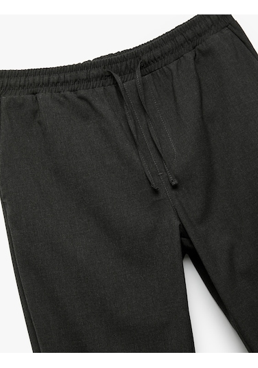 Koton Beli Bağcıklı Katlamalı Paça Cep Detaylı Slim Fit Pantolon Gri 6wam40038hw Gri