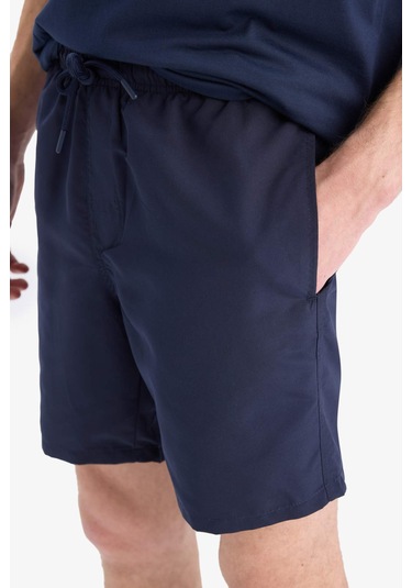 DeFacto Regular Fit Kısa Boy Cepli File Astarlı Beli Bağcıklı Düz Hafif Kumaş Deniz Şortu E5133AXNSNV256