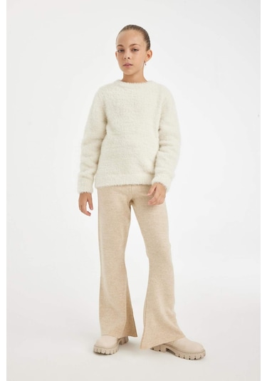 Defacto Kız Çocuk Flare Fit İspanyol Paça Basic Düz Triko Pantolon A6029A824WNBG588 Bej Defacto Kız Çocuk Flare Fit İspanyol Paça Basic Düz Triko Pantolon A6029A824WNBG588 Bej