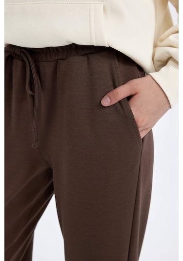 Defacto Regular Fit Beli Paçası Lastikli Cepli Uzun Boy Jogger Eşofman Altı S8381AZ24WNBN534 Kahve Defacto Regular Fit Beli Paçası Lastikli Cepli Uzun Boy Jogger Eşofman Altı S8381AZ24WNBN534 Kahve