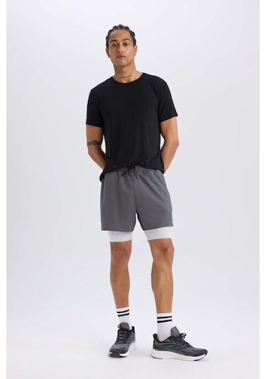 DeFactoFit Slim Fit Dar Kesim Sporcu Taytlı Şort E2760AX25SMAR58