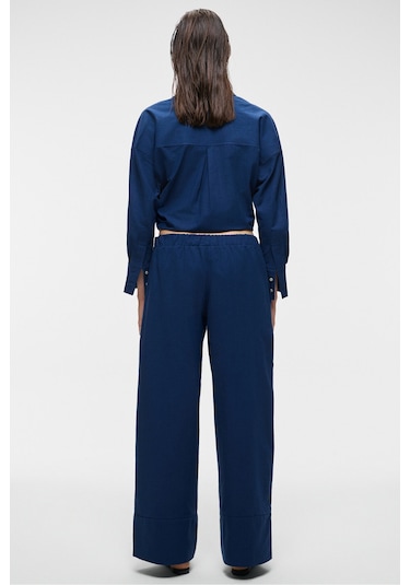 Melancholı Kadın %100 Pamuk Keten Görünüm Flamlı Geniş Paça Yüksek Bel Lastikli Lacivert Pantolon