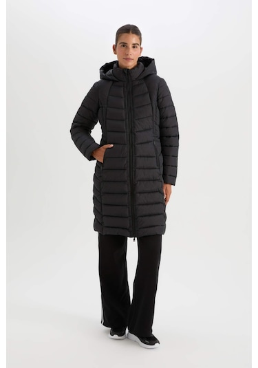 DeFactoFit Su İtici Uzun Şişme Mont Parka Kapüşonlu Slim Fit Dar Kesim Kapitoneli Fermuarlı Cepli A1556AX24WNBK81 Siyah