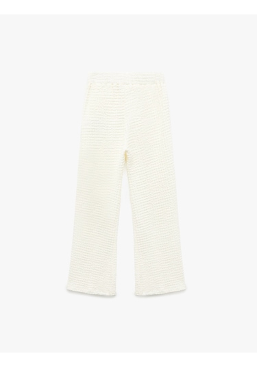 Koton Beli Lastikli Dokulu İspanyol Paça Pantolon Bej 5skg40179ak Ekru