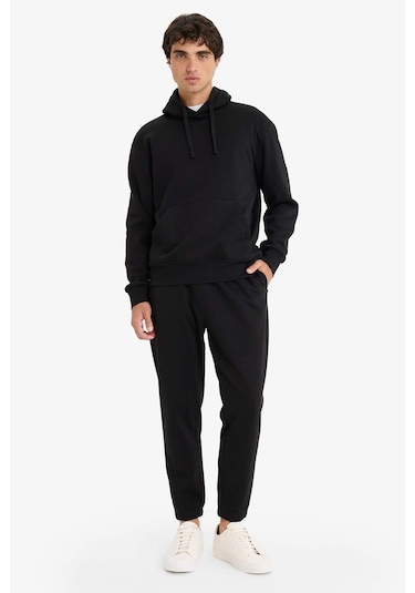 Defacto - Regular Fit Beli Bağcıklı Cepli Paçası Lastikli Şardonlu Basic Düz Jogger Eşofman Altı E6326AX25AU Siyah Defacto - Regular Fit Beli Bağcıklı Cepli Paçası Lastikli Şardonlu Basic Düz Jogger Eşofman Altı E6326AX25AU Siyah