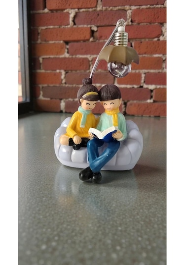 Oturan Çift Hediyelik Ürün Biblo Ürün Boyutu: 20cm 13cm