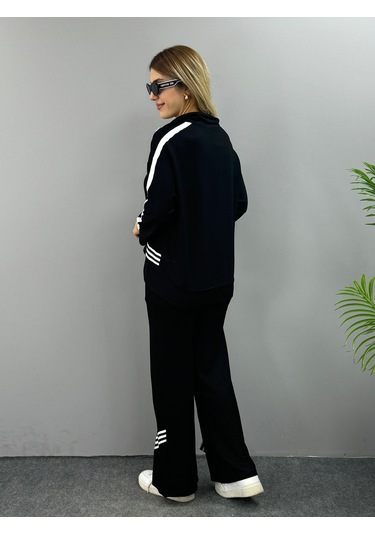 The İstanbul Kadın Polo Yaka Paça Yırtmaçlı Ribanalı İkili Takım Siyah
