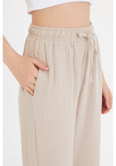 Thiff Gymwear Bej Bol Paça Müslin Kadın Pantolon Bej