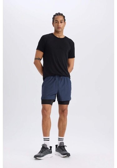 DeFactoFit Slim Fit Dar Kesim Sporcu Taytlı Şort E2759AX25SMNV94