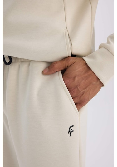 DeFactoFit Slim Fit Sporcu İnce Jogger Eşofman Altı Dar Kesim Skuba Dalgıç Kumaş Standart Paça Beli Bağcıklı Lastikli Paça Z9112AZ25SPBG721 DeFactoFit Slim Fit Sporcu İnce Jogger Eşofman Altı Dar Kesim Skuba Dalgıç Kumaş Standart Paça Beli Bağcıklı Lastikli Paça Z9112AZ25SPBG721