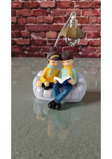 Oturan Çift Hediyelik Ürün Biblo Ürün Boyutu: 20cm 13cm