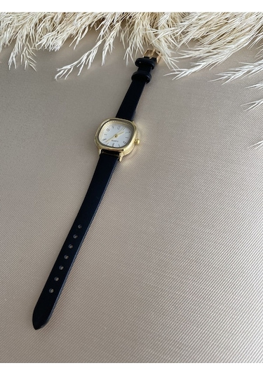 Retro Minimal Vintage Deri Kordon Kadın Kol Saati Kelebek Model Gümüş