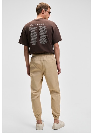 Jakob Erkek Dokuma Yıkamalı 4 Cepli Kalın Dokulu Paçası Lastikli Bej Pantolon