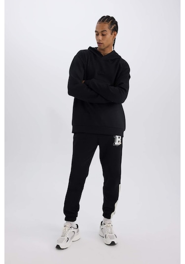 DeFactoFit NBA Boston Celtics Jogger Eşofman Altı Standart Fit Beli Bağcıklı Cepli Lastikli Paça D1562AX24WNBK81 Siyah DeFactoFit NBA Boston Celtics Jogger Eşofman Altı Standart Fit Beli Bağcıklı Cepli Lastikli Paça D1562AX24WNBK81 Siyah