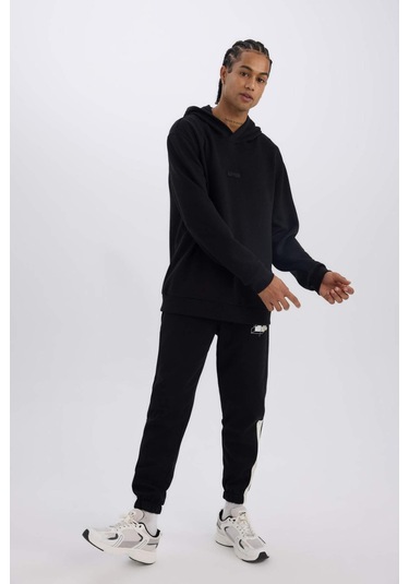 DeFactoFit NBA Boston Celtics Jogger Eşofman Altı Standart Fit Beli Bağcıklı Cepli Lastikli Paça D1562AX24WNBK81 Siyah DeFactoFit NBA Boston Celtics Jogger Eşofman Altı Standart Fit Beli Bağcıklı Cepli Lastikli Paça D1562AX24WNBK81 Siyah