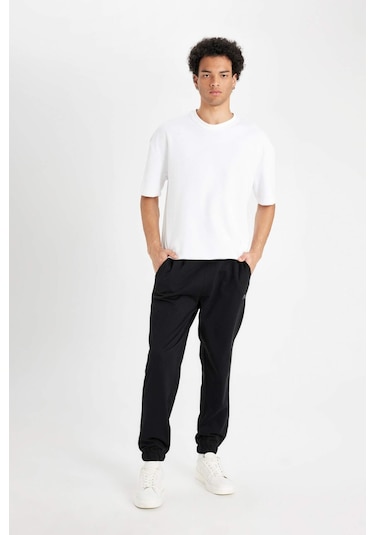 DeFacto Regular Fit Eşofman Altı Cepli Basic Düz Beli Bağcıklı Lastikli Paça D4416AX24AUBK81