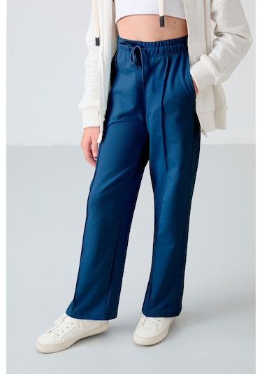 Tommy Life Parlament Cepli Ön Dikiş Detaylı Geniş Paça Kız Çocuk Eşofman Altı -75144 Mavi