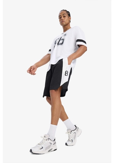 DeFactoFit Hızlı Kuruyan Standart Fit Sporcu Kısa Paça Şort E4127AX25SMBK81