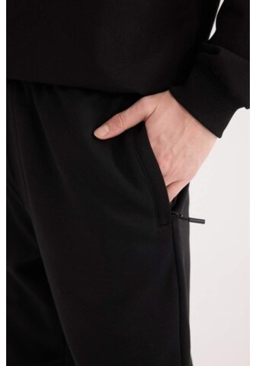 DeFacto Regular Fit İnce Eşofman Altı Fermuar Cepli Beli Bağcıklı Lastikli Paça B3657AX25SPBK81 DeFacto Regular Fit İnce Eşofman Altı Fermuar Cepli Beli Bağcıklı Lastikli Paça B3657AX25SPBK81