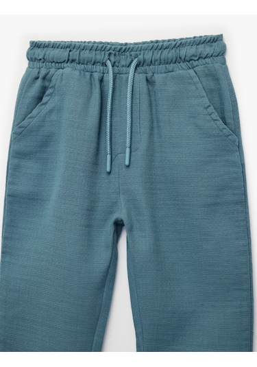 Koton Pamuklu Beli Bağcıklı Müslin Kumaş Basic Jogger Pantolon Mavi 6smb40023tw Mavi