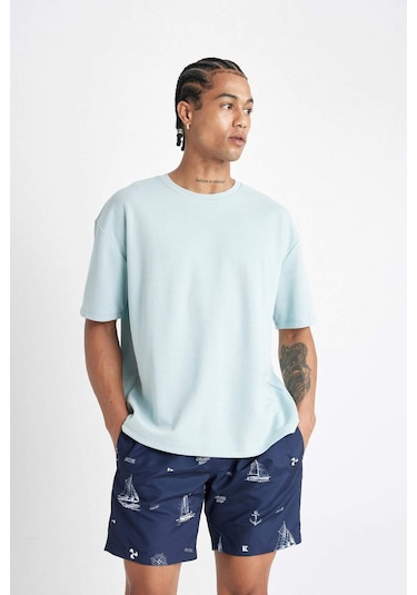 DeFacto Regular Fit Desenli File Astarlı Kısa Boy Deniz Şortu M8344AZ24HSNV256 DeFacto Regular Fit Desenli File Astarlı Kısa Boy Deniz Şortu M8344AZ24HSNV256