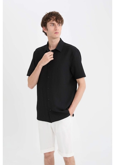DeFacto Regular Fit Polo Yaka Krinkıl Yazlık Kısa Kollu Siyah Gömlek E1223AX25SMBK27 DeFacto Regular Fit Polo Yaka Krinkıl Yazlık Kısa Kollu Siyah Gömlek E1223AX25SMBK27