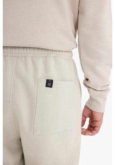 Defacto Regular Fit Beli Bağcıklı Cepli Paçası Lastikli Şardonlu Basic Düz Jogger Eşofman Altı E6326ax25aubg766 Bej
