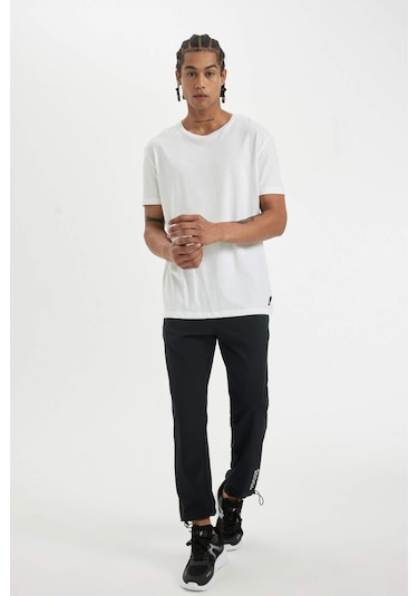 DeFactoFit Slim Fit Dar Kesim Çift Cepli Dokuma Sporcu Jogger C2833AX24SMBK81