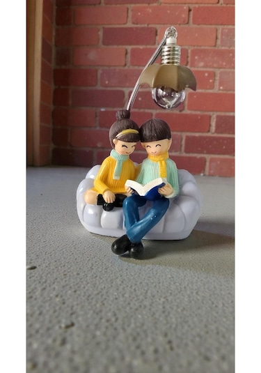 Oturan Çift Hediyelik Ürün Biblo Ürün Boyutu: 20cm 13cm
