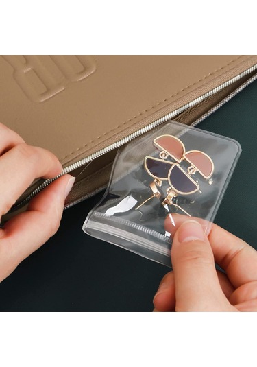 Anjiexun 84 Izgaralı Şeffaf Mücevher Saklama Defteri Ve 50 Parça Fermuarlı Çanta Şeffaf