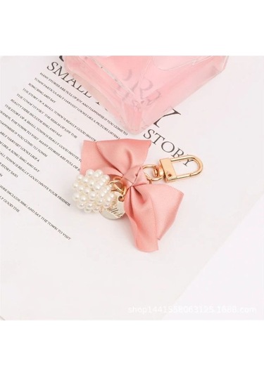 Pembe Kurdele İnci Taşlı Anahtarlık Ve Kulaklık Süsü İthalatçı Garantili Belirtilmemiş Belirtilmemiş