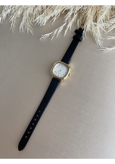 Retro Minimal Vintage Deri Kordon Kadın Kol Saati Kelebek Model Gümüş