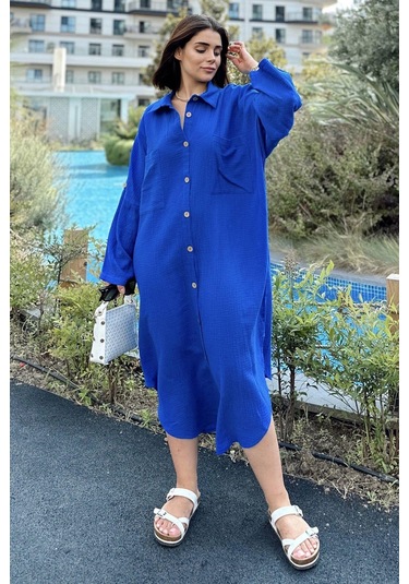 Kadın Saks Muslin Kumaş, Yarasa Kol, Eteği Oval, Çift Cepli, Uzun Oversize Salaş Gömlek Elbise Saks Kadın Saks Muslin Kumaş, Yarasa Kol, Eteği Oval, Çift Cepli, Uzun Oversize Salaş Gömlek Elbise Saks