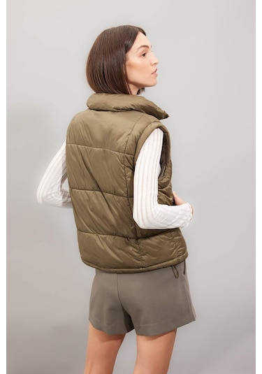 Defacto Su Geçirmez Şişme Yelek Dik Yaka Fermuarlı Cepli Etek Ucu Ayarlanabilir Lastikli Mevsimlik A0979AX24AUKH6 Haki Defacto Su Geçirmez Şişme Yelek Dik Yaka Fermuarlı Cepli Etek Ucu Ayarlanabilir Lastikli Mevsimlik A0979AX24AUKH6 Haki