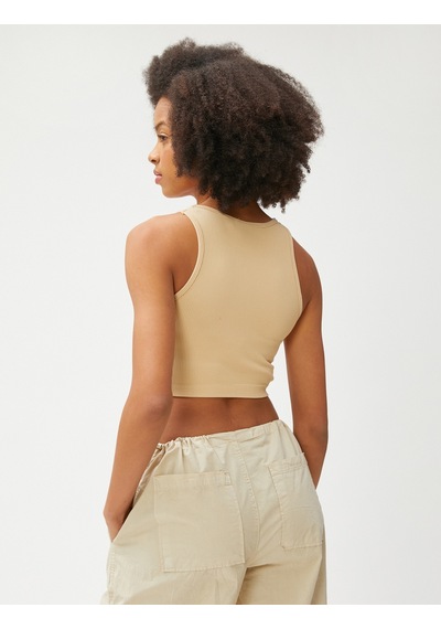 Koton Crop Atlet Fitilli Halter Yaka Kolsuz Bej 3sal30056ık 3SAL30056IK050 Ekru Koton Crop Atlet Fitilli Halter Yaka Kolsuz Bej 3sal30056ık 3SAL30056IK050 Ekru