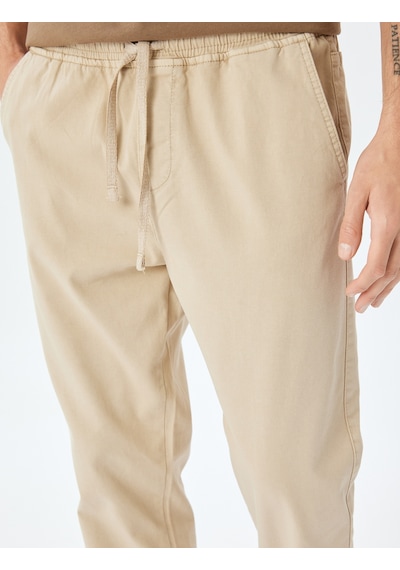 Koton Kanvas Pamuklu Beli Bağcıklı Chino Cep Detaylı Jogger Pantolon Bej 5sam40008hw Ekru