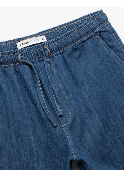 Koton Beli Bağcıklı Cep Detaylı Bermuda Oversize Jean Şort Koyu İndigo 5sam40126nd İndigo Koton Beli Bağcıklı Cep Detaylı Bermuda Oversize Jean Şort Koyu İndigo 5sam40126nd İndigo
