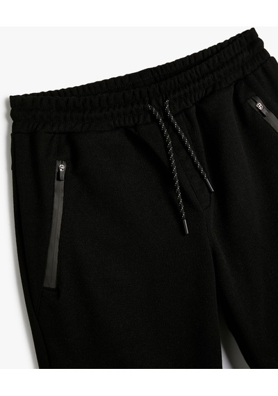 Koton Jogger Eşofman Altı Beli Bağcıklı Fermuar Cep Detaylı Siyah 4sam40043nk 4SAM40043NK999 Siyah Koton Jogger Eşofman Altı Beli Bağcıklı Fermuar Cep Detaylı Siyah 4sam40043nk 4SAM40043NK999 Siyah