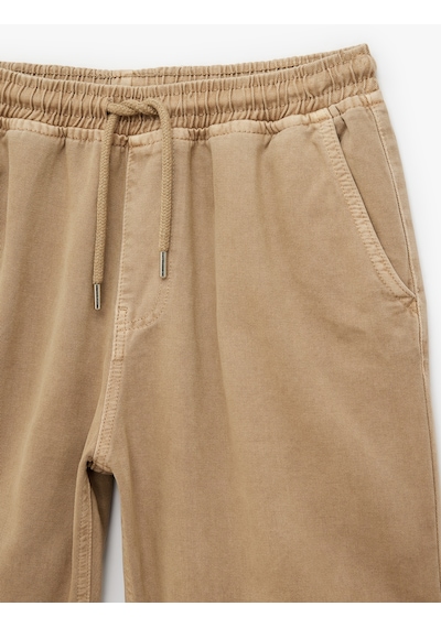 Koton Pamuklu Oversize Cepli Bol Beli Bağcıklı Baggy Jean Şort Bej 6sam40432nd Ekru