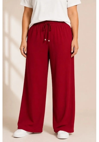 DefyModa Battal Beden Bürümcük Kumaş Beli Lastikli Bağcıklı Bol Paça Palazzo Pantolon - Bordo DefyModa Battal Beden Bürümcük Kumaş Beli Lastikli Bağcıklı Bol Paça Palazzo Pantolon - Bordo