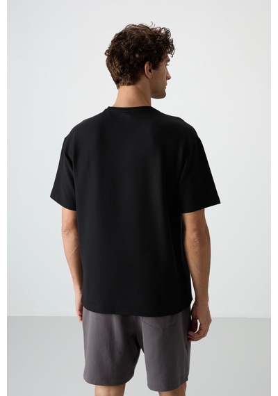 Air Jones Tommy Life Siyah Waffle İnterlok Yüzeyi Dokulu Oversize Fit Basic Erkek T-shirt - 88380 Siyah Air Jones Tommy Life Siyah Waffle İnterlok Yüzeyi Dokulu Oversize Fit Basic Erkek T-shirt - 88380 Siyah